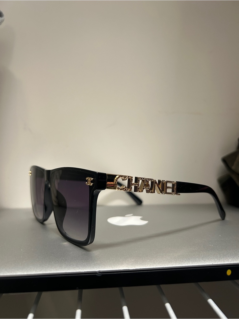 CHANEL Black Sunglasses with Gold Logo Temples